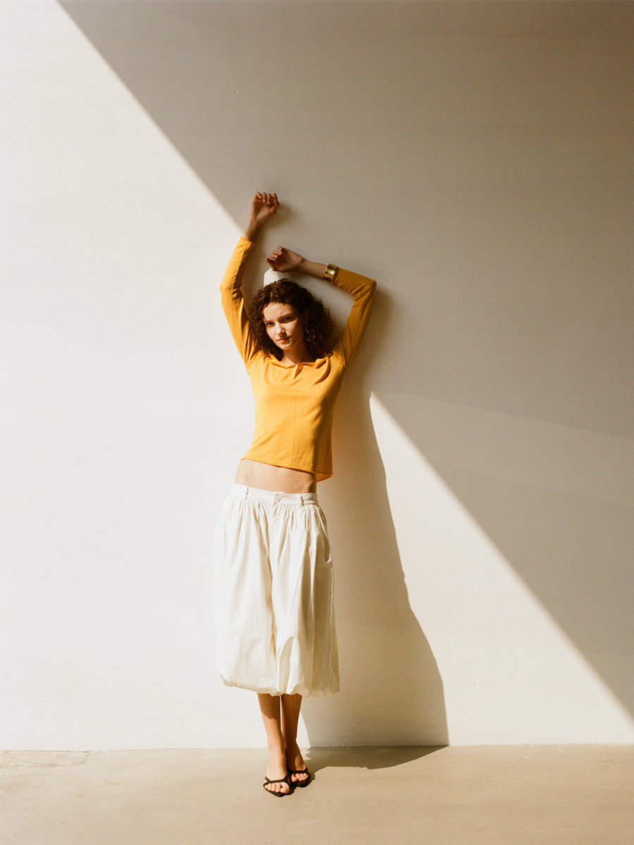 Hughum V-neck Tencel knit cut-out yellow black long sleeves