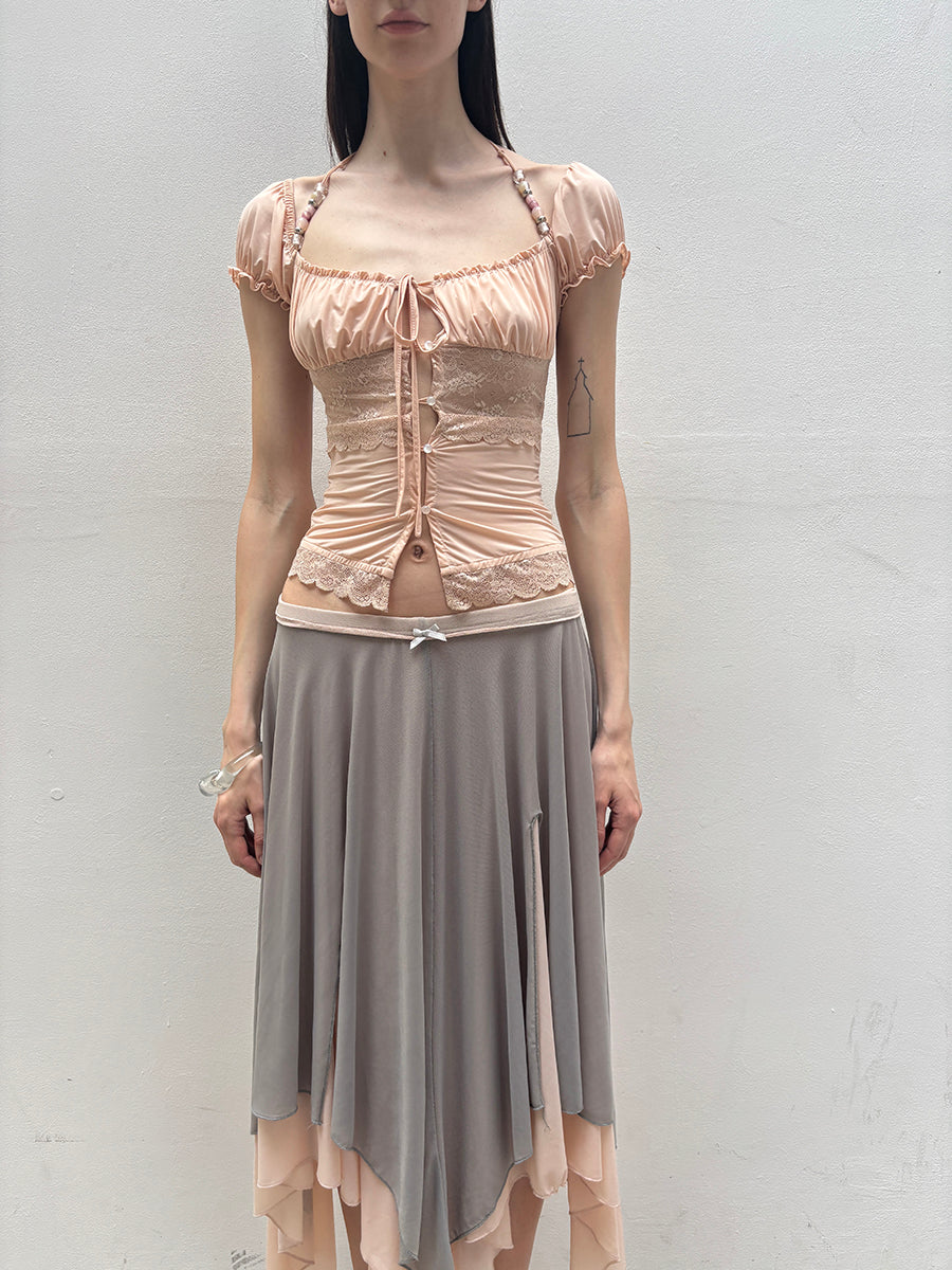 Dotyears Mesh panels contrast with fluttery maxi skirts